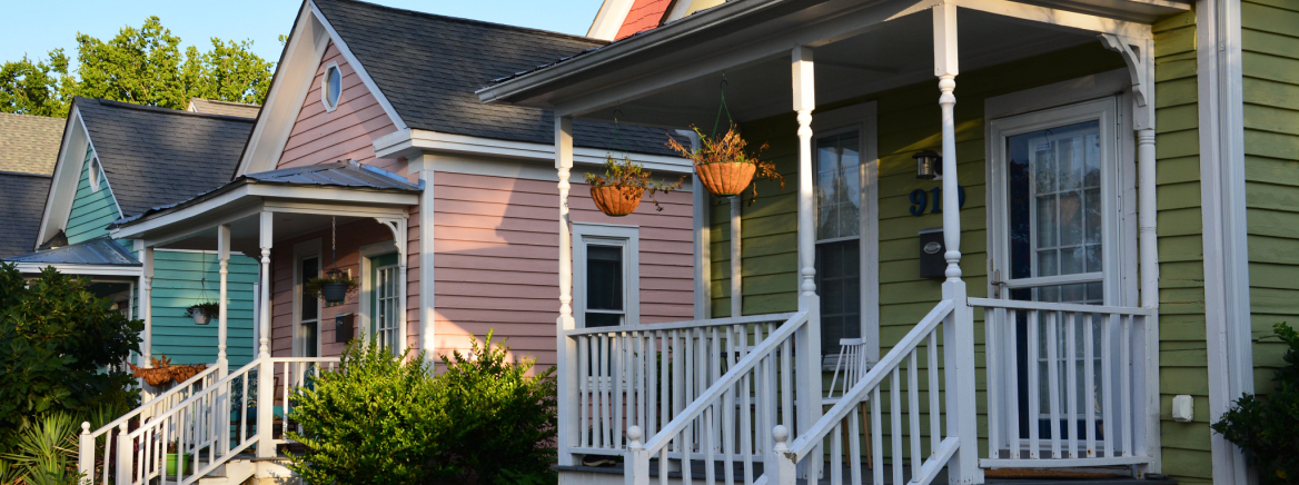 Header - Homes Residency Colorful shotgun homes in North Carolina.