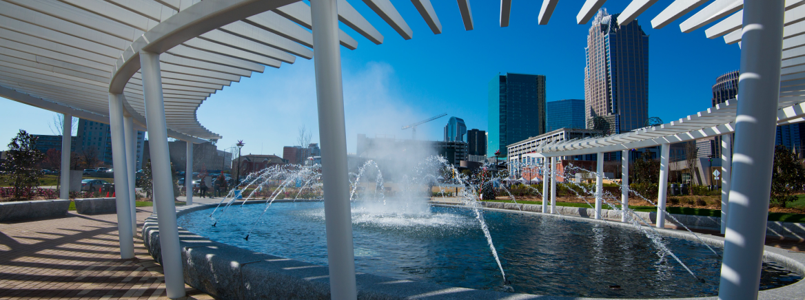First Ward Park Fountain The First Ward Park fountain with the Charlotte skyline in the background. Dec. 2015.